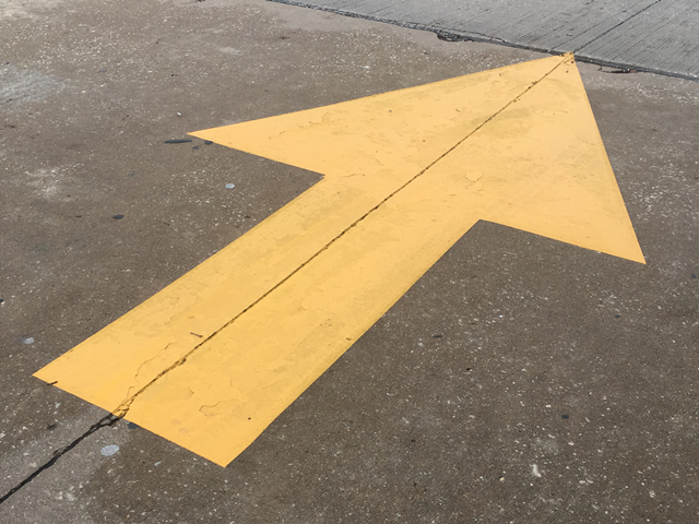 Directional Arrow In School Parking Lot